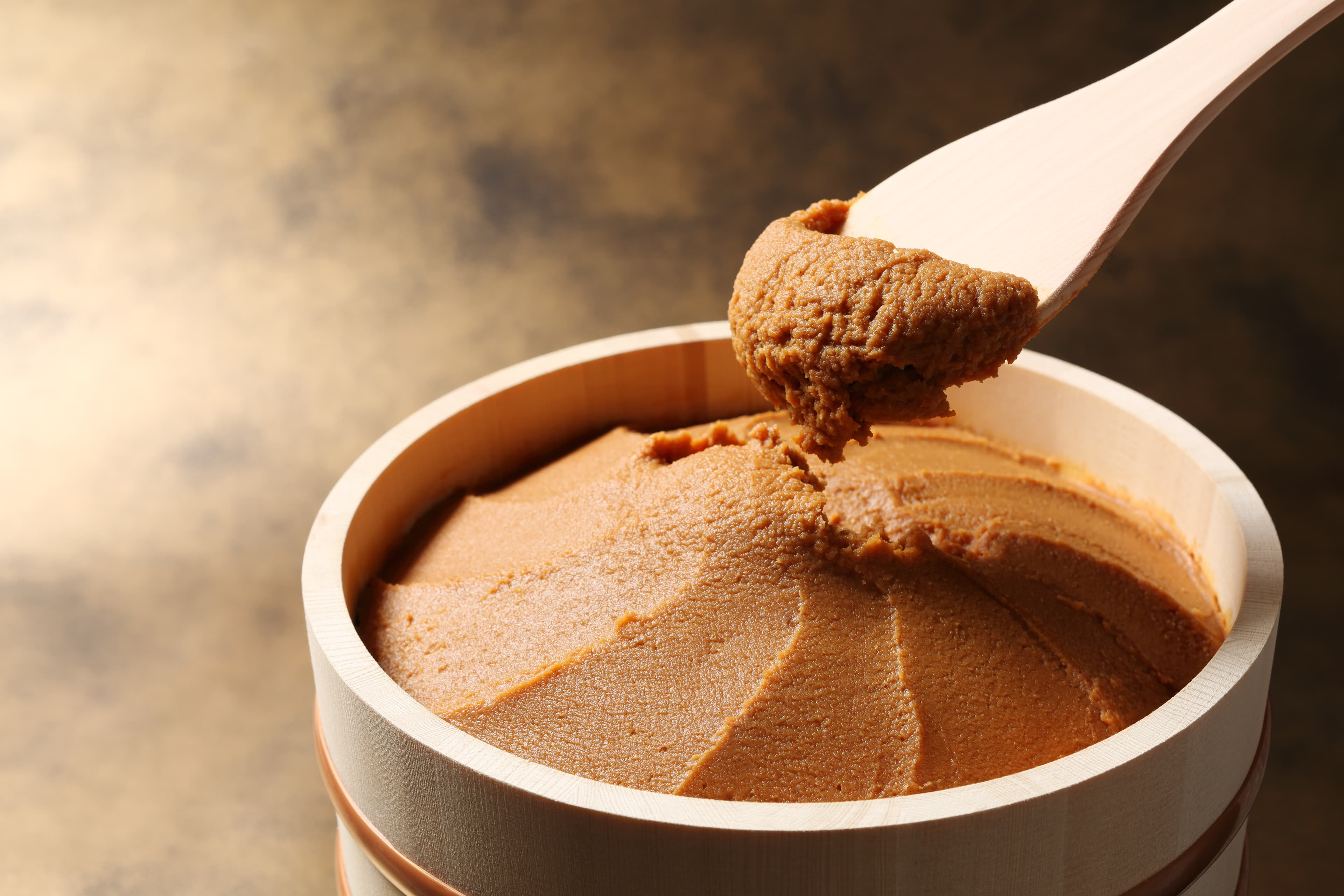 Japanese miso paste with a wooden spatula