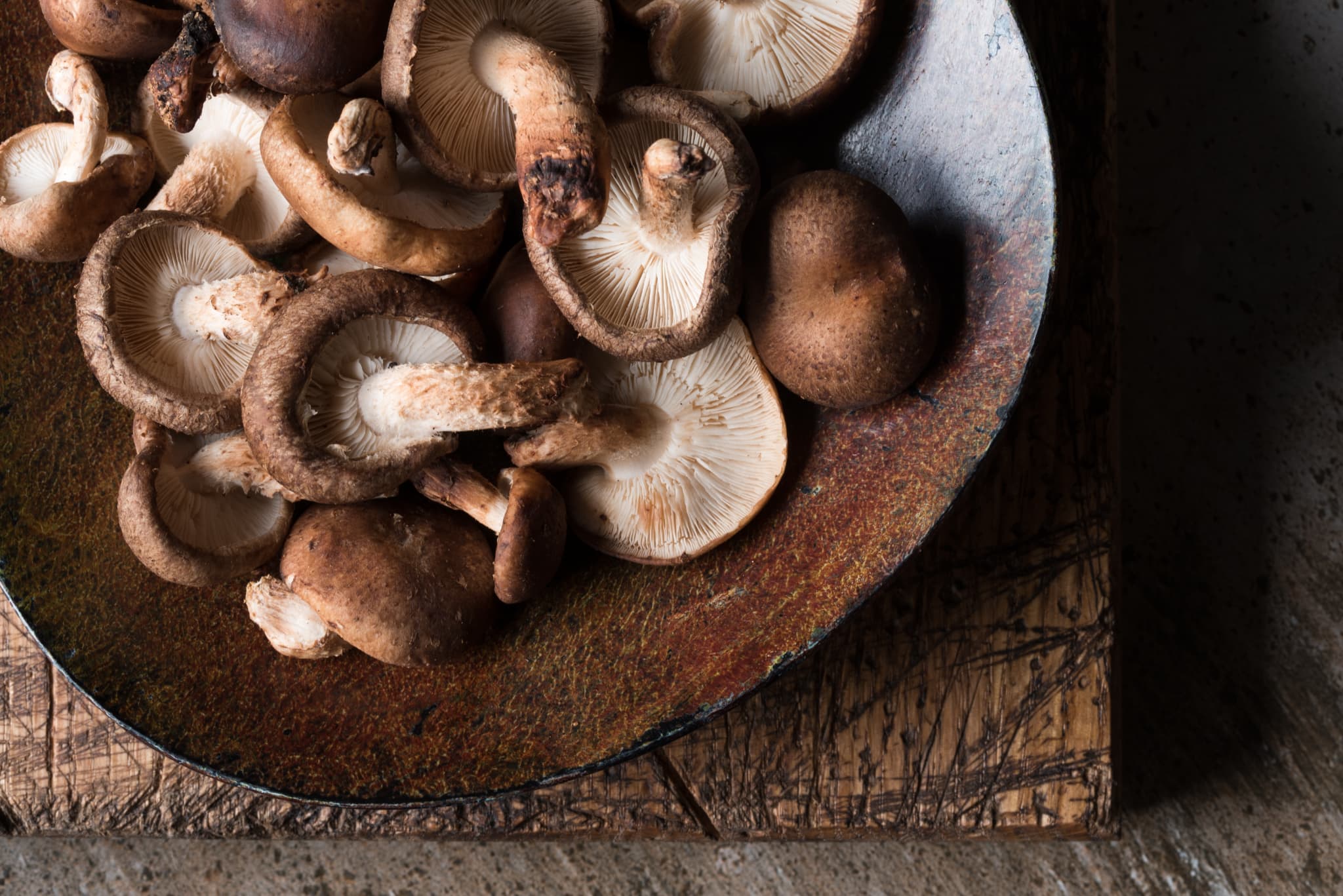 Japanese shiitake mushrooms on a rustic plate